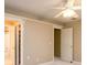 Neutral bedroom with open doors to a bathroom and another room at 1430 Hampton Hill Dr, Alpharetta, GA 30022