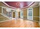 Dining room with hardwood floors, large windows, chandelier, and open view to the entry at 1430 Hampton Hill Dr, Alpharetta, GA 30022