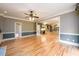 Inviting living room boasts hardwood floors and an open layout connecting to the kitchen at 1430 Hampton Hill Dr, Alpharetta, GA 30022