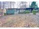 Charming single-story home with a brick exterior and beautifully landscaped front yard at 1760 Detroit Nw Ave, Atlanta, GA 30314