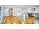 Open-concept area showcasing light wood floors and a kitchen ready for customization at 1760 Detroit Nw Ave, Atlanta, GA 30314
