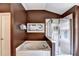 Modern bathroom featuring a jacuzzi tub and a separate glass-enclosed shower at 2695 Ridge Run Trl, Duluth, GA 30097