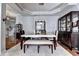 Elegant dining room features tray ceiling, hardwood floors and a large formal dining set at 2695 Ridge Run Trl, Duluth, GA 30097
