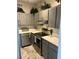 Well-equipped kitchen with stainless steel appliances and light countertops at 3060 Pharr Court N N Ct # 607, Atlanta, GA 30305