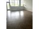 Bright living room featuring large windows offering an abundance of natural light and a view at 3060 Pharr Court N N Ct # 607, Atlanta, GA 30305