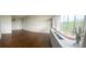 Spacious living room with large windows offering beautiful outdoor views at 3060 Pharr Court N N Ct # 607, Atlanta, GA 30305