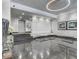 Grand lobby with modern lighting, tiled floors and comfortable seating for residents and their guests at 3060 Pharr Court N N Ct # 607, Atlanta, GA 30305