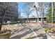 Outdoor patio area providing a comfortable area with furniture, bbq grills, and lovely landscaping at 3060 Pharr Court N N Ct # 607, Atlanta, GA 30305