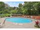 Refreshing outdoor swimming pool with plenty of deck space and lounge chairs for relaxation at 3060 Pharr Court N N Ct # 607, Atlanta, GA 30305