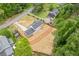 A nice home with an expansive lawn, featuring a recently installed roof and convenient driveway at 565 Deer Sw Run, Lilburn, GA 30047