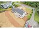 A well-maintained, two-story home featuring an expansive backyard and a convenient side entrance at 565 Deer Sw Run, Lilburn, GA 30047