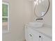 Modern bathroom with a vessel sink, matte black hardware, and bright natural light at 565 Deer Sw Run, Lilburn, GA 30047