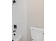 Bathroom featuring white subway tile shower and toilet at 565 Deer Sw Run, Lilburn, GA 30047