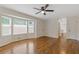 Living room featuring hardwood floors, bay window, and a view of the yard at 565 Deer Sw Run, Lilburn, GA 30047