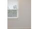 Bright room featuring a window with blinds, providing natural light and privacy at 565 Deer Sw Run, Lilburn, GA 30047