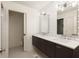 Modern bathroom with double vanity, white subway tiles, and a separate toilet room for added privacy at 922 Barton Woods Ne Rd, Atlanta, GA 30307