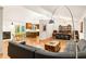 Open concept living and dining area with hardwood floors and a fireplace at 922 Barton Woods Ne Rd, Atlanta, GA 30307