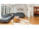 Spacious living room with hardwood floors, large windows, and a comfortable seating area at 922 Barton Woods Ne Rd, Atlanta, GA 30307