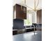 Modern kitchen with stainless steel appliances, and a contemporary lighting fixture at 11554 Serenbe Ln, Chattahoochee Hills, GA 30268
