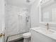 Modern bathroom with a glass shower, marble tiling, and a new vanity at 2645 Preston Ridge Ln, Dacula, GA 30019