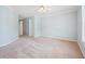 Neutral bedroom with carpet, baseboard trim, and natural lighting from the windows at 2645 Preston Ridge Ln, Dacula, GA 30019