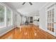 Breakfast nook with hardwood flooring, views to backyard, and access to kitchen at 2645 Preston Ridge Ln, Dacula, GA 30019