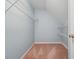 Walk-in closet with wire racks and lighting at 2645 Preston Ridge Ln, Dacula, GA 30019
