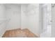Modest walk-in closet with multiple shelves for optimal storage and organization at 2645 Preston Ridge Ln, Dacula, GA 30019