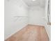 Small walk-in closet featuring wire shelving and neutral carpet at 2645 Preston Ridge Ln, Dacula, GA 30019