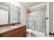 Well-maintained bathroom with granite countertop and glass shower door at 2656 Old Norcross Rd, Tucker, GA 30084