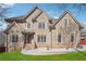 Charming two-story brick home with well-manicured lawn and inviting entrance at 2656 Old Norcross Rd, Tucker, GA 30084