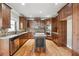 Gourmet kitchen featuring granite countertops, stainless steel appliances, and custom cabinetry at 2656 Old Norcross Rd, Tucker, GA 30084
