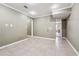 Tiled laundry room with space for washer/dryer and easy access to additional rooms at 2656 Old Norcross Rd, Tucker, GA 30084
