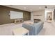 Finished basement features a media screen, plush carpet, and comfortable seating area at 2663 Marcia Dr, Lawrenceville, GA 30044