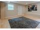 Bright basement featuring recessed lights, a window and a large, stylish black and gray area rug at 2663 Marcia Dr, Lawrenceville, GA 30044