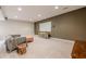 Large basement with media screen, plush carpet, and comfortable seating area at 2663 Marcia Dr, Lawrenceville, GA 30044