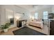 Bright bedroom with a desk, large mirror, and comfortable bed with pink linens at 2663 Marcia Dr, Lawrenceville, GA 30044