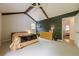 Spacious main bedroom with exposed beams, ample natural light, and en-suite access at 2663 Marcia Dr, Lawrenceville, GA 30044