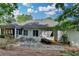 The backyard features a screened-in porch, patio, landscaping, and plenty of space for outdoor entertaining at 3003 Heavenly Ln, Snellville, GA 30078