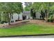 Charming home featuring manicured landscaping and a classic facade, creating inviting curb appeal at 3003 Heavenly Ln, Snellville, GA 30078