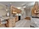This kitchen features wood cabinets, granite countertops, and modern appliances at 3003 Heavenly Ln, Snellville, GA 30078