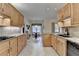 Beautiful kitchen showcasing ample cabinetry, stainless appliances, and a breakfast nook with window at 3003 Heavenly Ln, Snellville, GA 30078