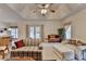 Spacious living room with modern furniture, bright natural light, and french doors at 3003 Heavenly Ln, Snellville, GA 30078