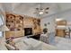 This living room boasts large built-in bookshelves, fireplace, and plush seating at 3003 Heavenly Ln, Snellville, GA 30078