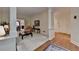 Spacious living room with view to dining room and white door at 3003 Heavenly Ln, Snellville, GA 30078