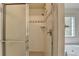 Updated shower with glass door and tiled surround, paired with a separate soaking tub at 3003 Heavenly Ln, Snellville, GA 30078