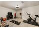 Finished basement space features a workout area with exercise equipment at 310 Tradea Tarn, Roswell, GA 30076