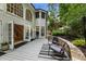 Exterior deck with outdoor seating and access to the home's interior at 310 Tradea Tarn, Roswell, GA 30076