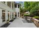 Exterior deck with outdoor seating and beautiful landscaping at 310 Tradea Tarn, Roswell, GA 30076