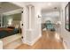 Bright hallway leading to a bedroom shows a view of the upstairs foyer at 310 Tradea Tarn, Roswell, GA 30076